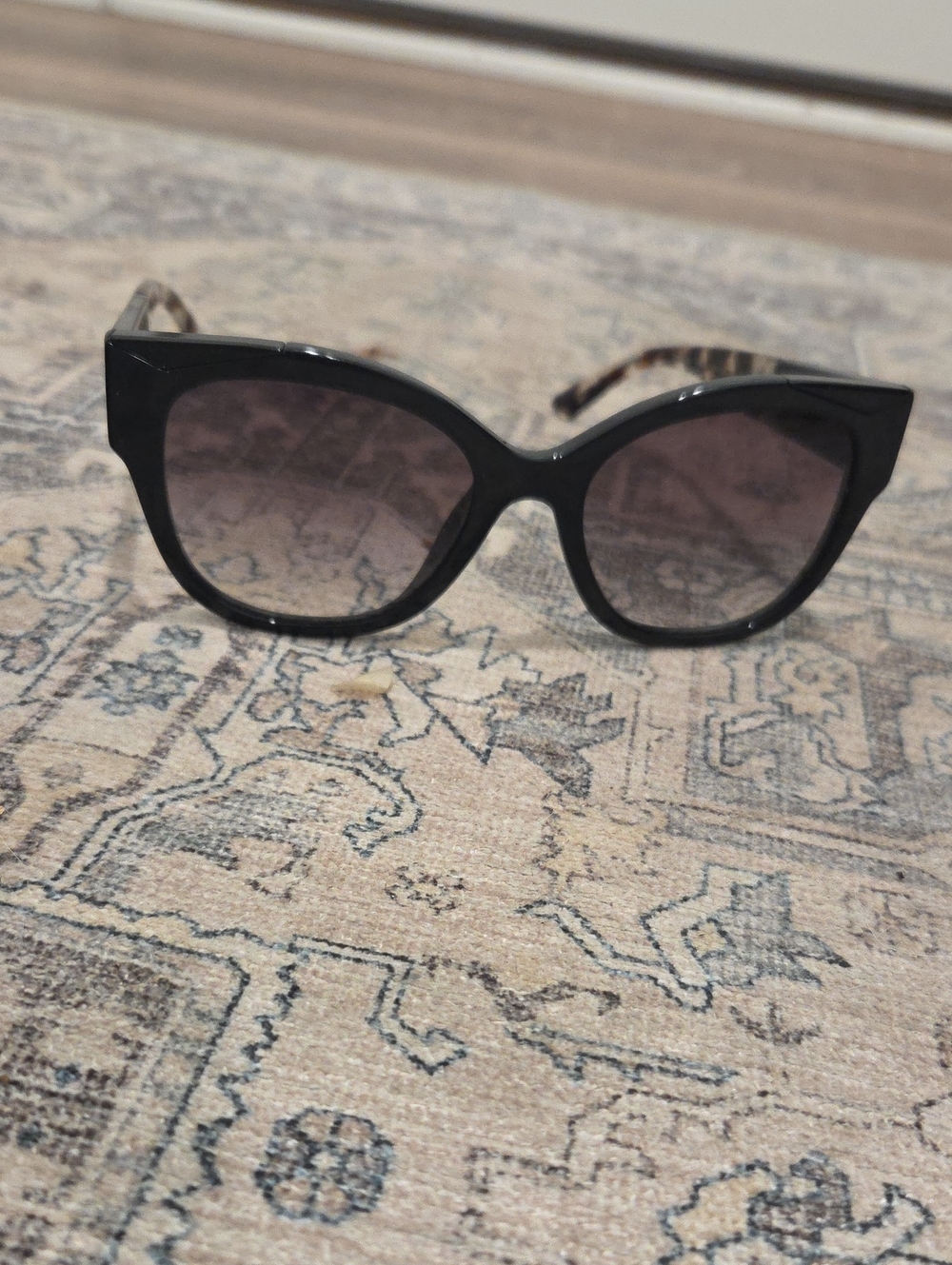 Prada Black Cat-Eye Sunglasses with Gradient Lenses